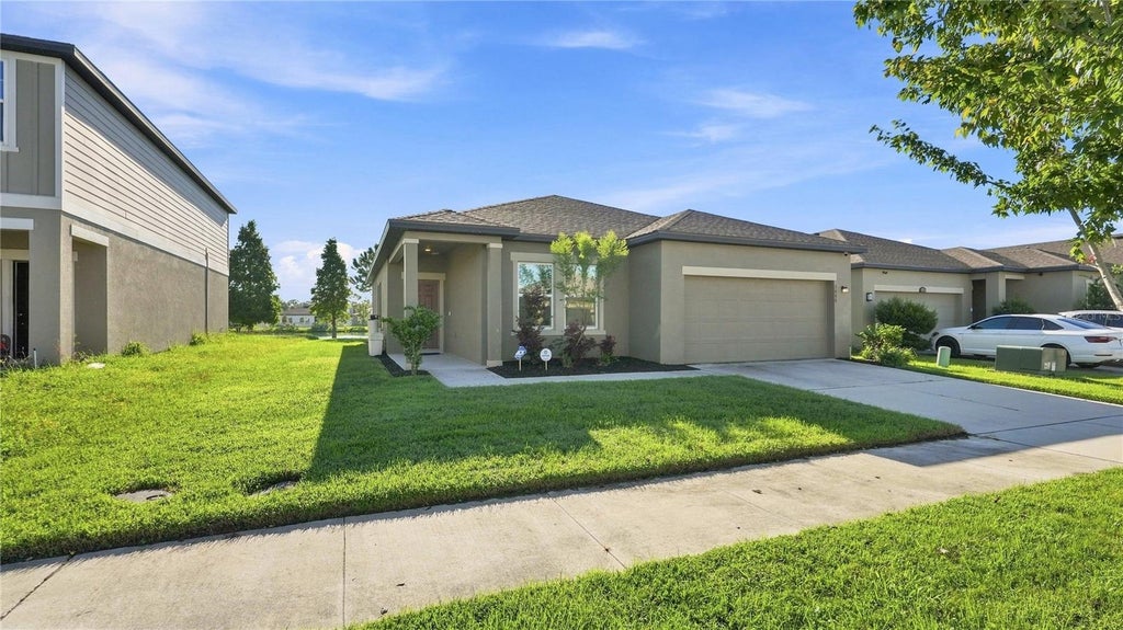 Photo of 5646 Alexander Springs Place, Lakeland, FL 33811 (MLS # TB8546636)