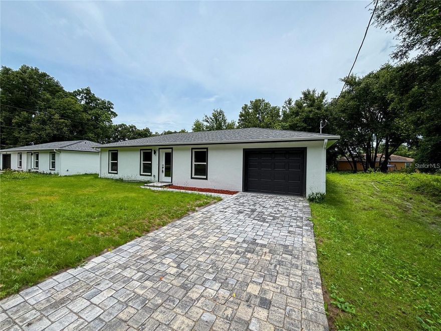 One or more photo(s) has been virtually staged. AMAZING MODERN HOUSE!!!! This home has all the extras you have been looking for, including granite countertops, stainless steel appliances, fully tiled shower and tub surrounds, and super-durable luxury vinyl plank flooring throughout, as well as a new fully sodded yard. The spacious open floor plan allows ample space for entertaining with an open concept Kitchen. You have to see it now