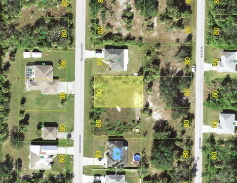 Photo of 430 Ravenswood Boulevard, Port Charlotte, FL 33954 (MLS # C7516520)