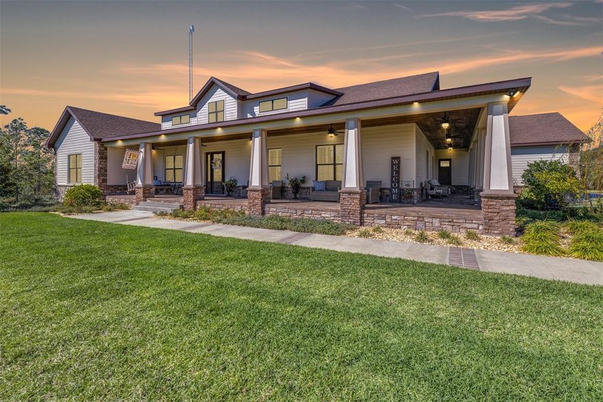 Exquisite 40-Acre Estate

Welcome to Hammock Estate, a stunning custom-built home and ranch on nearly 40 acres in the heart of Central Florida. Designed for both luxury living and agricultural use, this fenced and cross-fenced property features lush pastures and wooded areas, making it ideal for a homestead, hobby farm, or a place to raise livestock and horses.

Built in 2020, the high-quality concrete block home with Hardie board siding offers 3 bedrooms, 2.5 bathrooms, and an exceptional split floor plan with elegant architectural details, including cathedral ceilings in the living room, 10' ceilings throughout the home, and a vaulted tray ceiling in the master suite. The spacious gourmet kitchen boasts Café stainless steel appliances, an oversized walk-in pantry with custom shelving, and a breakfast nook. A formal dining room and a dedicated office space with large sliding barn doors provide a mix of function and charm, with the office offering serene views of the front porch and yard.

The expansive primary suite features French doors to the lanai, dual custom walk-in closets, and a luxurious ensuite bath with a soaking tub, enclosed walk-in glass shower, and double vanities. The home also includes a large laundry/mudroom for added functionality and plantation shutters throughout for timeless elegance and privacy.

Outdoor living is at its finest with a huge stamped-concrete wraparound 890 sqft front porch, perfect for relaxing and enjoying the peaceful surroundings. A screened-in saltwater pool with waterfall and spa creates a private oasis, while the stamped-concrete 830 sqft lanai with covered and open-air decking is ideal for entertaining. 

The estate includes a 1,000 sqft, three-car garage with concrete parking pad, an asphalt driveway and ample parking between the home and barn. The barn features a feed room, utility room, and a 2-room flex space with a custom-built wood bar and full bathroom, making it perfect for gatherings or additional workspace. It also offers multiple stalls with direct pasture access, cow pens, and a covered concrete parking station for equipment.

Located just 30 minutes from the world-class Streamsong Resort, known for its renowned golf courses and luxury spa, this estate also provides the convenience of being under 15 minutes from Publix, Walmart, dining, and historic downtown Bartow, which offers boutique shopping, bars, and lively weekend events.

This exceptional estate offers the perfect blend of modern luxury and country living, making it ideal for a hobby farm, equestrian enthusiasts, or those looking to raise livestock in a peaceful rural setting.

Schedule your private showing today and experience this one-of-a-kind Florida estate firsthand!