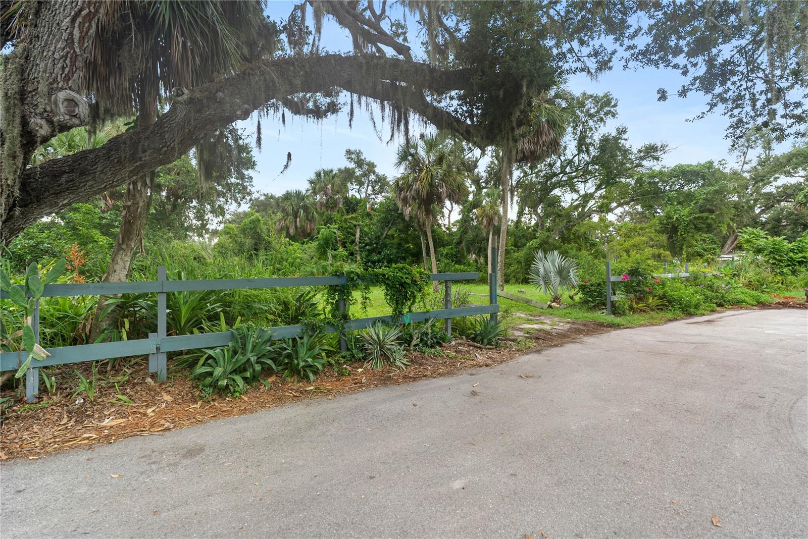 A rare find in Sarasota—this oversized homesite offers a unique opportunity to build your dream home, tucked away on a quiet street with no through traffic in the City of Sarasota. With generous dimensions and mature landscaping, the lot provides a private setting with plenty of space for a custom residence, pool, and outdoor living.
Zoned RSF-2 for single-family use, the property has access to public water, sewer, electricity, cable, and internet, making it truly ready to build.
The location is hard to beat—just 10 minutes to Downtown Sarasota, 12 minutes to SRQ International Airport, 15 minutes to St. Armands Circle, and 20 minutes to world-renowned Siesta Key Beach. Families will also appreciate access to top-rated Sarasota schools, while investors will see the value in securing a property in one of the fastest-growing and most desirable markets on Florida’s Gulf Coast.
With no HOA or CDD fees, this lot offers the freedom to build while staying close to Sarasota’s shopping, dining, arts, and beaches. Whether you’re ready to build now, hold for future growth, or capture Sarasota’s strong rental and resale demand as an investor, this parcel combines privacy, accessibility, and location in one exceptional opportunity.
