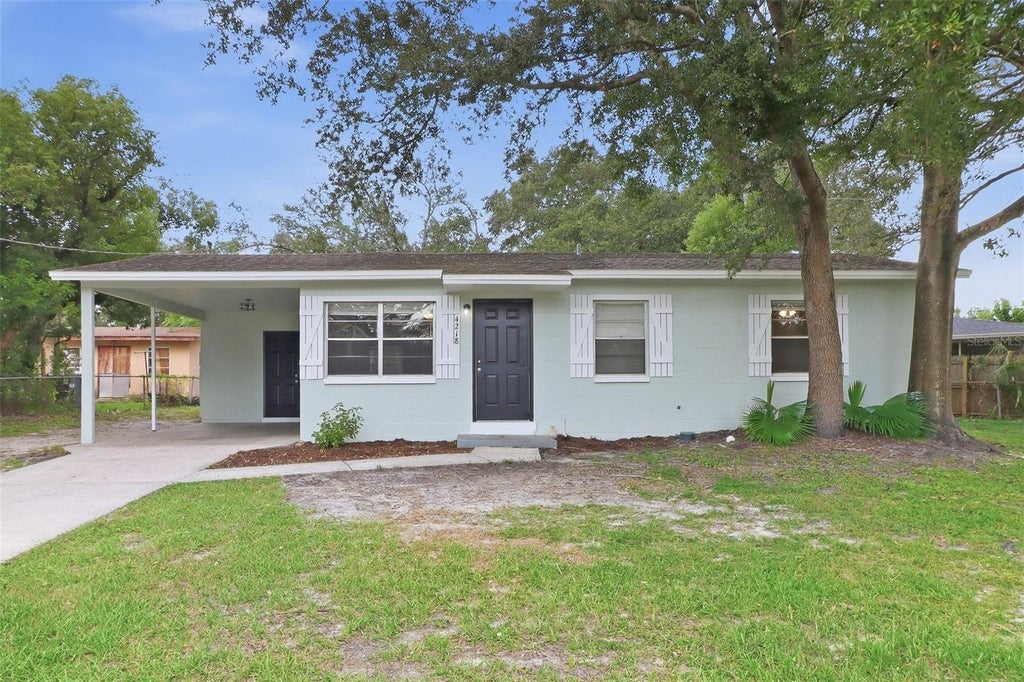 Photo of 4218 Empire Place, Tampa, FL 33610 (MLS # TB8554187)
