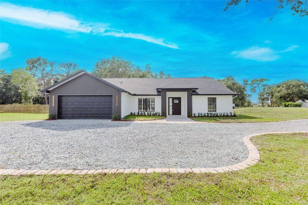 Photo of 4025 Meadow Run Lane, Wesley Chapel, FL 33543 (MLS # O6340998)