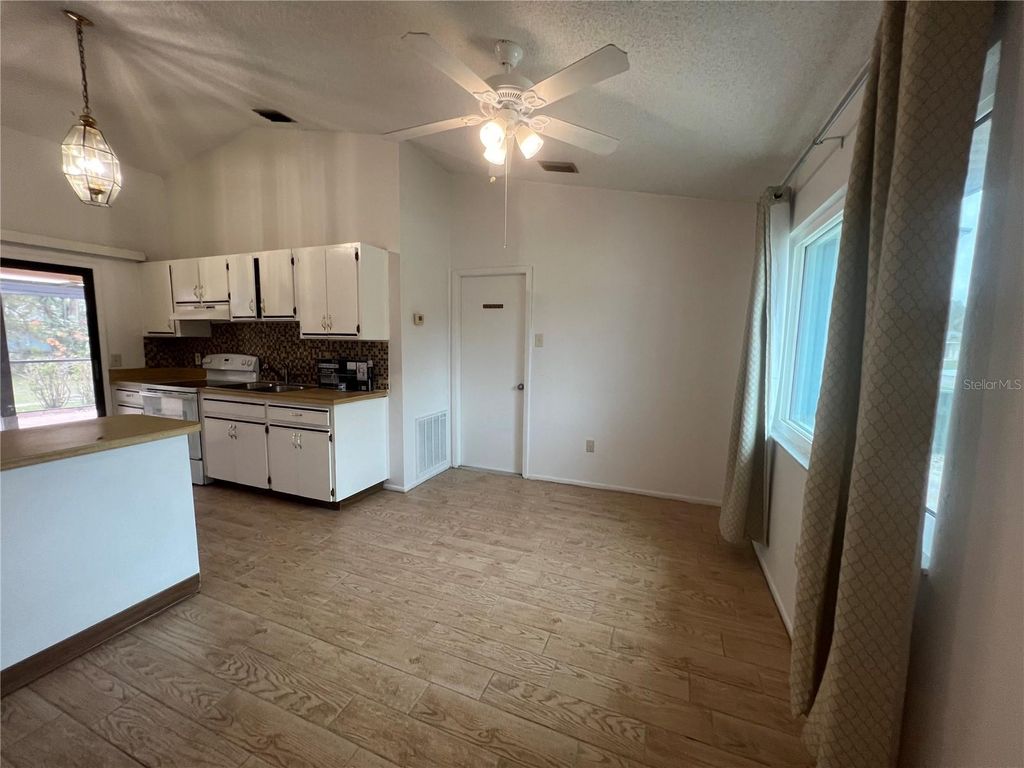 Photo of 3703 Suburban Lane, North Port, FL 34287 (MLS # C7523438)