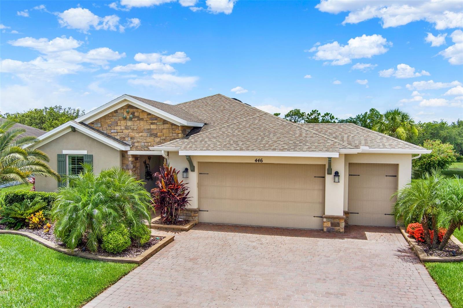 Location! Location! Location!” This pristine home has Ultimate Privacy with a TRIPLE VIEW! WATER, CONSERVATION, AND GOLF COURSE! Welcome home to one of the BEST and UNIQUE VIEWS in all of Solivita! This Cambria Model rests on an oversized lot, with a Golf Cart Garage PLUS a 4’ FT EXTENSION. This home also comes with FULL SOLAR! Average electric bill is just $45 a month! This immaculate house is in the very popular TREVISO community in Solivita. Treviso is known for having its own private golf cart path that takes you directly to the Village Center in minutes! As you walk up the paver driveway with custom landscaping, walk through your glass front door and be greeted by a large foyer with tray ceiling and custom built in shelving. You’re immediately drawn to see views into your lanai and water view. This home is a split floorplan featuring 3 bedrooms and 2 ½ bathrooms – perfect for entertaining guests & family! The front bedroom has a 4’ extension with access to a full bath with tub & shower. The 3rd bedroom has French Doors which can easily be used as a study or as a bedroom for overnight guests. As you walk through the grand foyer, you enter into the living area with open concept, with a beautiful water and conservation view at first sight! The Gourmet kitchen is a chef’s dream as it is includes tons of features such as Quartz Countertops, Double Oven, Cooktop, Soft Close Drawers, Stainless Steel Appliances, Farm Sink, and so much more! The large laundry room has 42” Cabinets and Utility Sink. The Primary Suite is oversized with tray ceiling and sitting area, two walk-in closets, with an En-Suite bath with dual sink vanity, and custom tiled shower! The outside lanai is PARADISE as you have TWO areas to relax and enjoy the scenery – the Covered & Screened-in Lanai PLUS an extra Outdoor Patio w/ Fire Pit! Extra Upgrades include: FRESH EXTERIOR PAINT – June 2025, Custom Stone on the Front of Home, Plantation Shutters throughout, Luxury Laminate Flooring Throughout, Quartz Counters in All Baths & Kitchen, Tray Ceilings with Crown Molding in Foyer, Great Room and Master Bedroom, 4’ Garage Extension, Golf Cart Garage, and so much more! Solivita offers endless amenities including 14 heated swimming pools, indoor pool and indoor walking track, state of the art fitness centers, pickleball courts, lighted tennis courts, golf, over 250+ clubs to join, 3 community restaurants, Farmers Markets every Monday and Friday, and so much more! Only 30 minutes from Disney and all of Orlando’s major attractions! Publix, Aldi’s & Super Walmart are also just a few miles outside the Main Gate! Convenient to shopping and major roadways. Poinciana Lakes Plaza is a MAJOR NEW SHOPPING CENTER that opened directly across from the Solivita Main Gate! This AMAZING new shopping center features so many restaurants and shopping including: Sprouts Grocery, Ross, TJ MAXX, ULTA Beauty, Hair Cuttery, Burlington, Rack Room Shoes, PETCO, Outback, 5 Guys, First Watch, Urgent Care, Dentist, TD Bank – AND SO MUCH MORE TO COME! Call today to schedule your private showing!