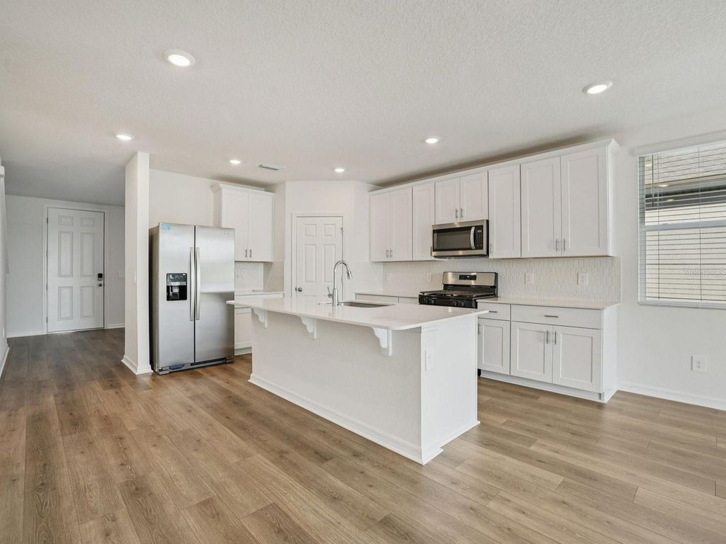 Photo of 787 Sunshower, Lady Lake, FL 32159 (MLS # O6377582)