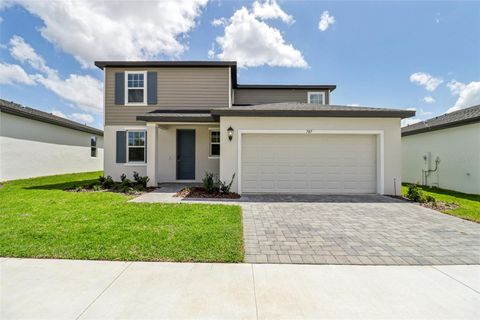 Photo of 787 Sunshower, Lady Lake, FL 32159 (MLS # O6377582)