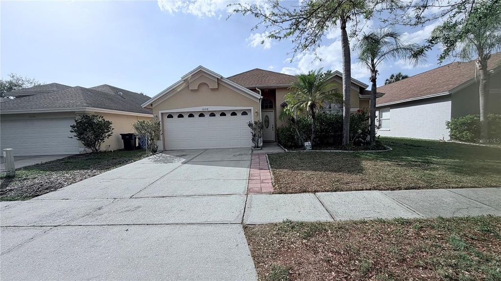 Photo of 10216 Oasis Palm Drive, Tampa, FL 33615 (MLS # TB8499611)