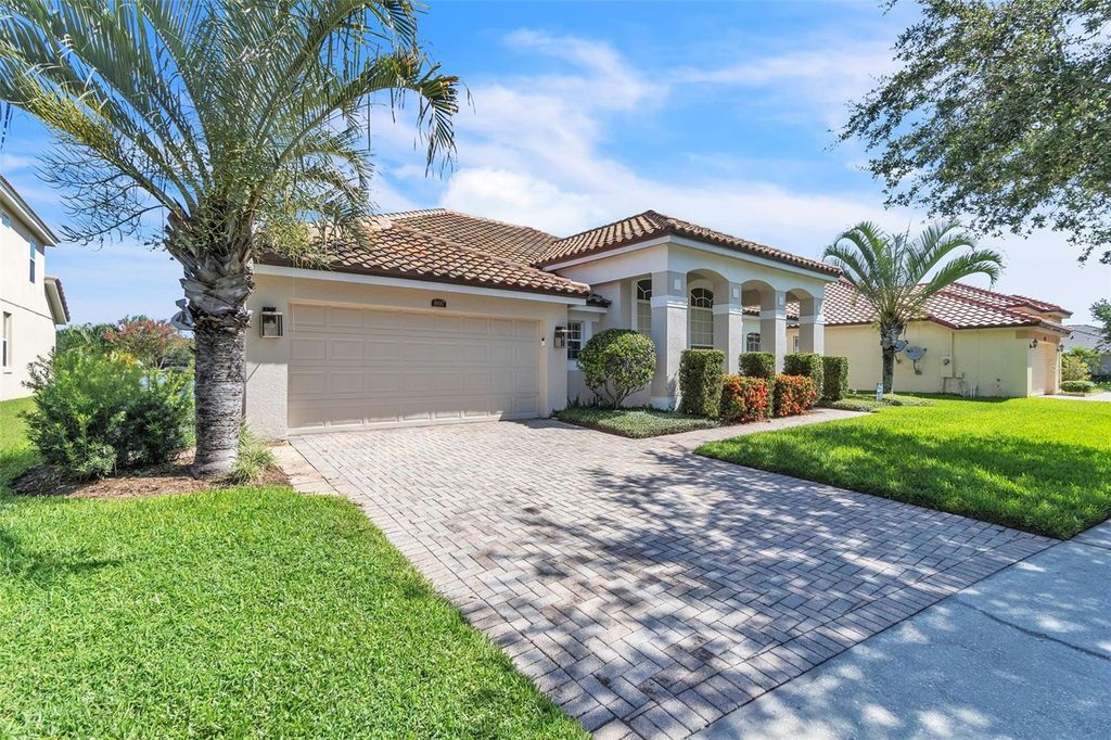 Photo of 9957 Oak Quarry Drive, Orlando, FL 32832 (MLS # O6374089)