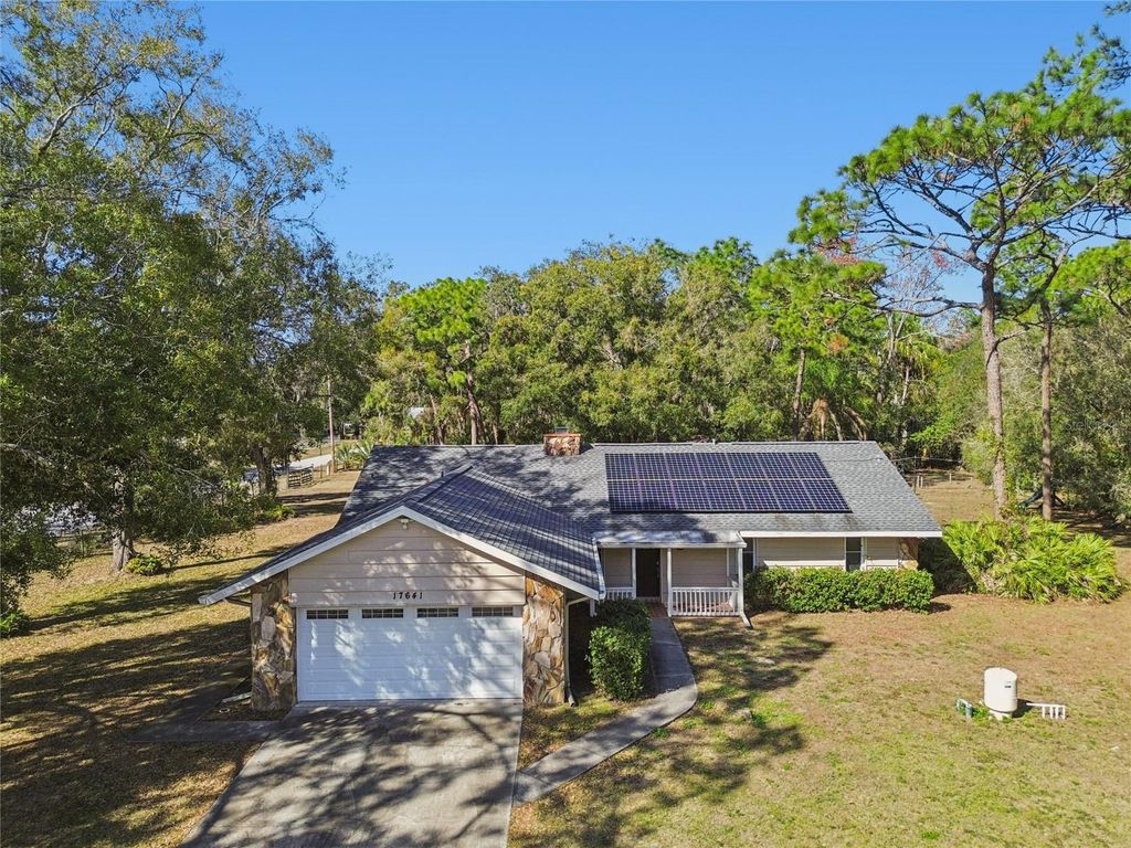 Photo of 17641 Deerfield Drive, Lutz, FL 33558 (MLS # TB8459029)