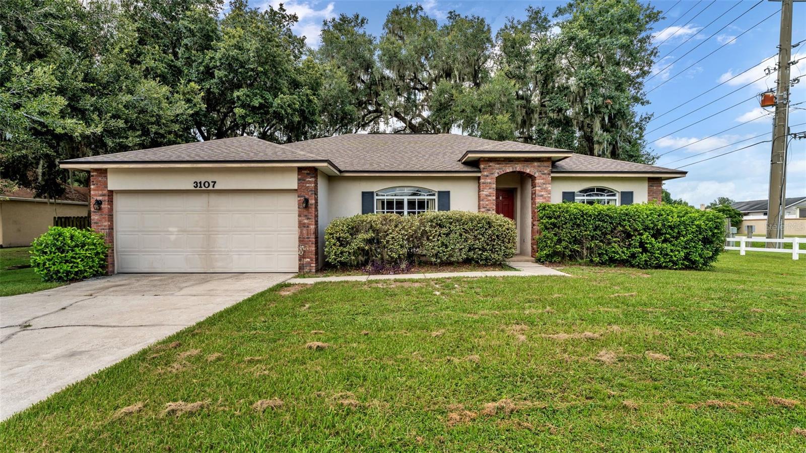 One or more photo(s) has been virtually staged. Welcome to Galloway Oaks in North Lakeland! This charming 3-bedroom, 2-bath home offers true peace of mind with major upgrades already completed—roof, A/C, hot water heater, and drainfield all replaced in 2021. Featuring loads of natural lighting with a functional split floorplan, this home provides plenty of closet space, a kitchen overlooking the large fully fenced backyard, and a comfortable flow for everyday living.
Situated on a desirable corner lot, you’ll enjoy added outdoor space, a 2-car garage with laundry area, and a huge screened lanai perfect for entertaining or relaxing year-round.
Conveniently located just minutes from Interstate 4, commuting to Tampa, Orlando, or nearby theme parks is a breeze. Local dining, shopping, schools, medical facilities, and parks are all close by, making this home the perfect combination of comfort and convenience.
Don’t miss your opportunity to own in this sought-after community with upgrades already done for you—schedule your private showing today!
