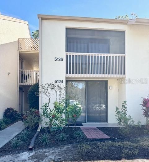 Photo of 5124 Harpers Croft St #7, Sarasota, FL 34235 (MLS # A4679022)