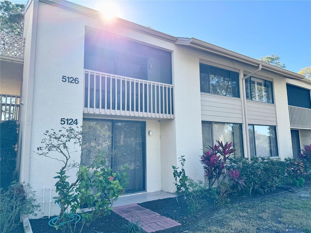 Photo of 5124 Harpers Croft St #7, Sarasota, FL 34235 (MLS # A4679022)