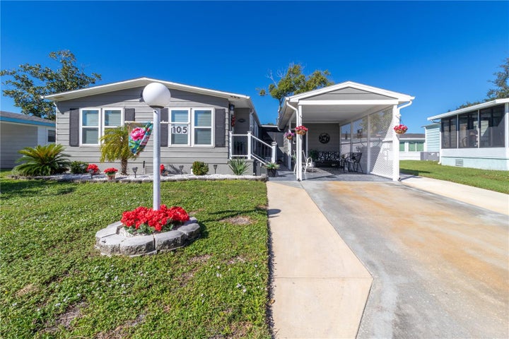 Photo 1 of 51 — 105 MEADOW CIRCLE, ELLENTON, FL 34222