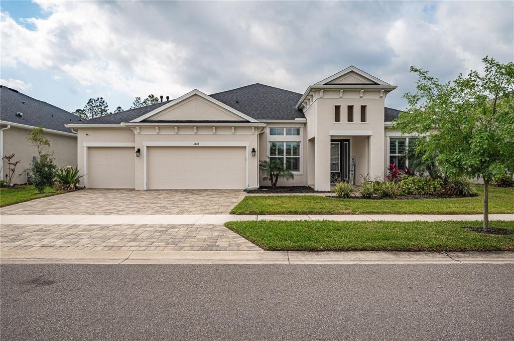 Photo of 4206 Tour Trace, Land O Lakes, FL 34638 (MLS # TB8429846)