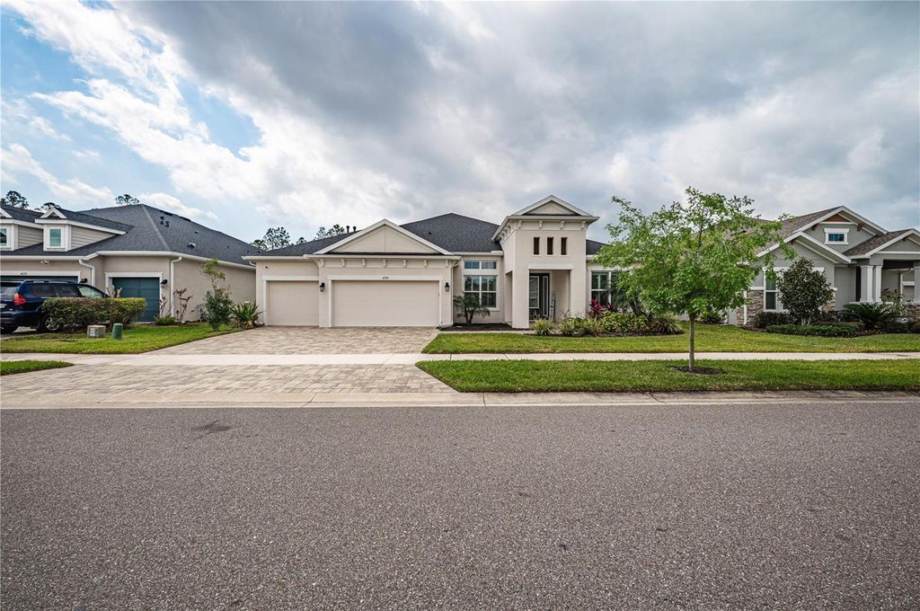 Photo of 4206 Tour Trace, Land O Lakes, FL 34638 (MLS # TB8429846)