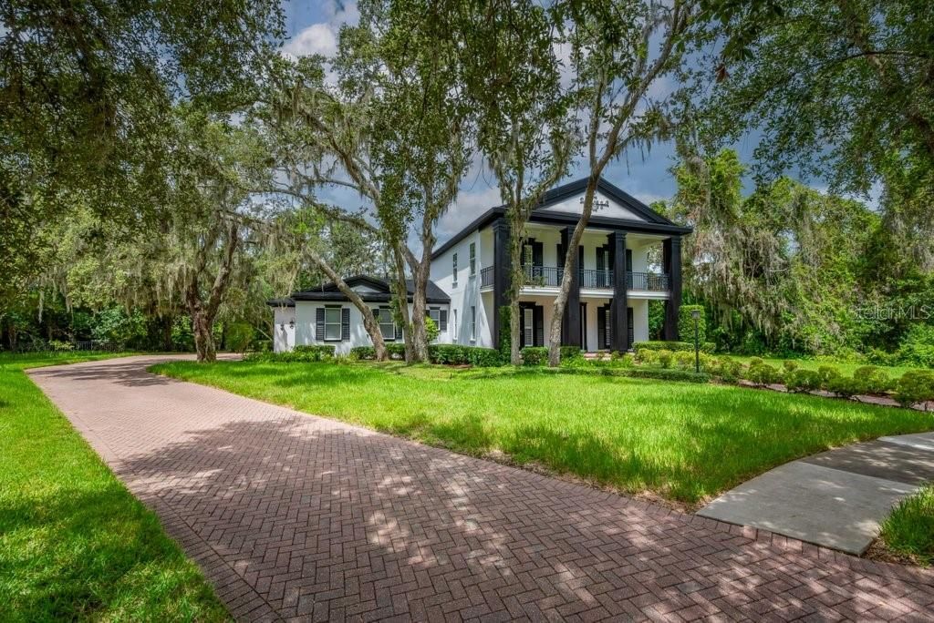 Photo of 16301 Dunlindale Drive, Lithia, FL 33547 (MLS # TB8410869)