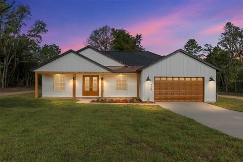 Photo of 8200 SW 125th Court Road, Dunnellon, FL 34432 (MLS # OM702563)