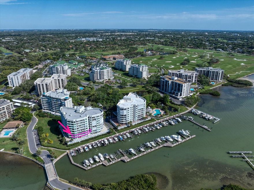 Discretely located behind the guarded gates of the prestigious Belleair Country Club, in the private and gated waterfront enclave of Seaside, this stunning second-floor condo offers elegance, security, and an enviable lifestyle. From the moment you enter the building, you’re welcomed by a beautifully appointed lobby that sets the tone for the refined living experience ahead. Double entry doors lead into a truly impressive residence, where rich wood floors, crown molding, and thoughtful designer details create a sense of warmth and sophistication. The open floor plan includes a spacious family room with sliders that open to a private balcony—perfect for sipping morning coffee, enjoying evening sunsets, or entertaining guests with the Intracoastal as your backdrop. The sleek, updated dine-in kitchen is a dream for any home chef, featuring stainless steel appliances, quartz countertops, a custom tile backsplash, a breakfast bar with pendant lighting, and a generous pantry. The adjacent dining room offers panoramic views of the Intracoastal, creating a stunning setting for everyday meals or formal gatherings. A convenient half bath adds to the functionality of the space. The split-bedroom layout provides ultimate privacy, with the impressive primary suite boasting a dedicated office nook, a walk-in closet, and a spa-like ensuite with a double sink vanity, jetted tub, and a spacious walk-in shower. The second bedroom is light-filled, offers ample closet space, and has its own private ensuite bath with a tub/shower combo. Additional highlights include a large interior storage room, remote-controlled blinds, hurricane shutters for peace of mind, a sparkling community pool, and secure under-building parking. Just a short drive to two private golf and country clubs, shopping, dining and sparkling beaches. With its prime location, resort-style amenities, and luxurious finishes, this condo offers the perfect blend of comfort, style, and security in one of Belleair’s most sought-after communities.