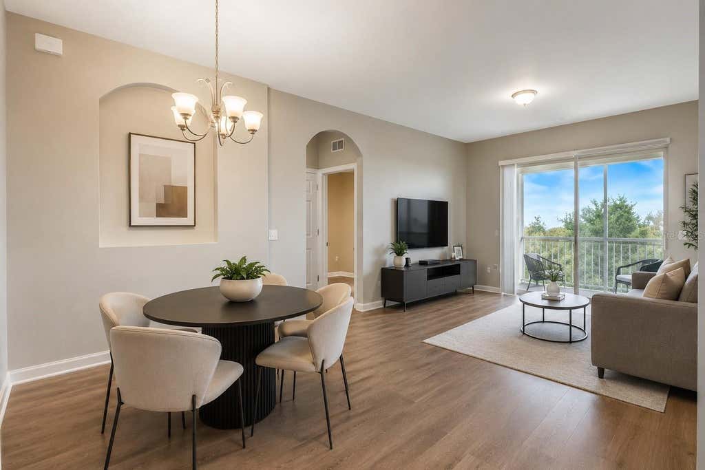 Photo of 8630 Buccilli Drive #303, Orlando, FL 32829 (MLS # O6436818)