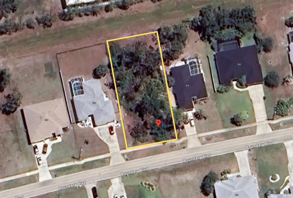 Photo of 517 Boundary Boulevard, Rotonda West, FL 33947 (MLS # A4667639)