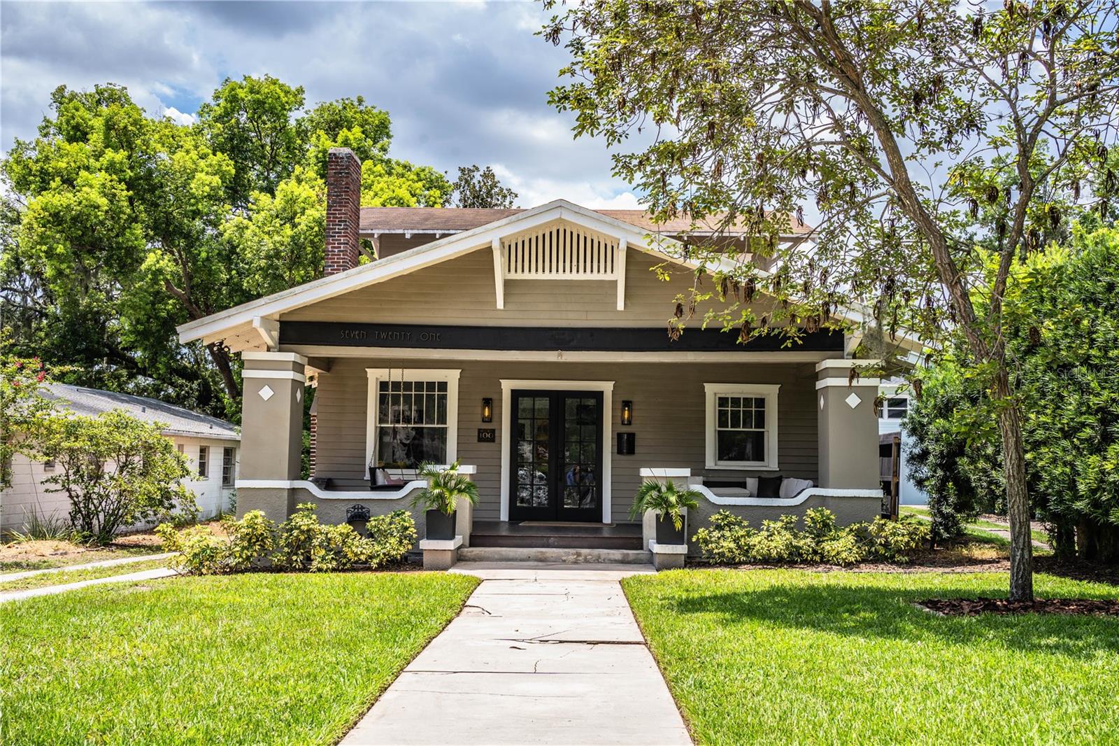 Welcome to this beautifully furnished home, just steps from Florida Southern College and the iconic Lake Hollingsworth. Location is everything, and this home places you near S. Florida Ave, downtown Lakeland, and the lively Dixieland area, putting the best of Lakeland at your fingertips. A quick walk takes you to the stunning Florida Southern College campus, featuring Frank Lloyd Wright’s renowned architecture, along with the Frank Lloyd Wright Museum. As you approach this charming residence, you'll be greeted by its inviting curb appeal, highlighted by a spacious front porch with a swing — perfect for relaxing or entertaining guests. Inside, the home boasts original hardwood floors, elegant furnishings, and beautiful art throughout. The cozy Living Room features comfortable seating, a large TV, plenty of natural light, and a book-filled shelving unit for your reading pleasure. Step through double French doors into the expansive dining area, where a grand dining table awaits to host memorable meals with friends and family. The primary bedroom, located on the first floor, features a king-sized bed, a modernized bathroom, and a large closet that offers plenty of space. There’s also a den/office that can easily serve as a fourth bedroom. Upstairs, you’ll find two fully furnished bedrooms and a shared Jack-and-Jill bathroom. The home also includes an interior laundry room, complete with a washer and dryer, ample storage, and cabinetry. For the chef, the kitchen is a dream! — granite countertops, a tiled backsplash, a gas range, stainless steel appliances, and everything you need to make life easier. The backyard is a true retreat, with a brick-paved deck, lounge seating, new fencing, lush landscaping, and more. This home’s prime location in Lakeland is second to none. Don’t miss out on the chance to make it yours — schedule a showing today!