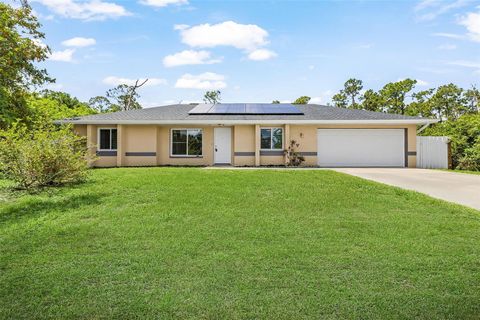 Photo of 18271 Temple Avenue, Port Charlotte, FL 33948 (MLS # OM725494)