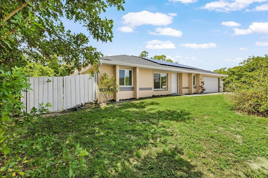 Photo of 18271 Temple Avenue, Port Charlotte, FL 33948 (MLS # OM725494)