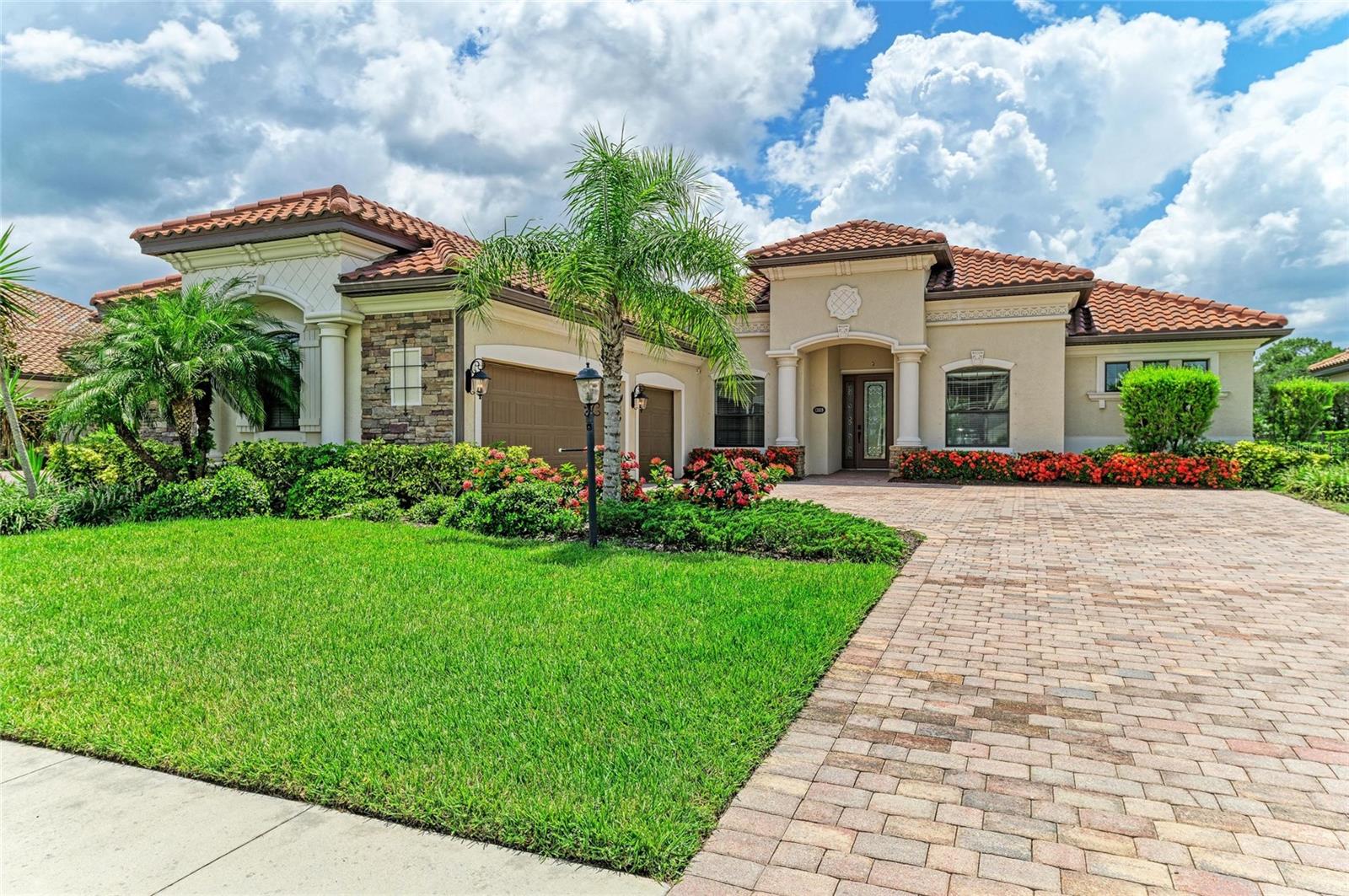 OH, WHAT A VIEW !!! Welcome to 13819 Swiftwater Way.... This beautifully maintained Cambridge model is perferctly situated towards the end of a cul de sac features warm dark hardwood floors and oversized tile flooring and features 4 bedrooms and 2 1/2 baths. Imagine yourself sitting out back on the expansive lanai and enjoying magnificent preserve and water views will take your breath away. The gourmet kitchen is a chef's dream with a 5 burner gas stovetop and double ovens. Deep sink with touch faucet, granite counters and more. Enjoy Amazing sunsets over the water from a large screened lanai with a heated in ground pool and spa. The outdoor kitchen has a gas grill and beverage fridge. An oversized master suite with his and hers vanities, a soaking tub and a walk-in shower. Two guest bedrooms plus home office/den with double doors for privacy and could double as a 4th bedroom if needed. Large 3 car garage is ideal for storage. Bridgewater is a Gated community where landscaping is included in the low HOA. This home is conveniently located adjacent to James L Patton Park, with a lake, boat launch, and trails for outdoor activities. Close to shopping and restaurants...Bridgewater is centrally located, gated and a maintenance assisted community. Great place to call home....Will not last !!!