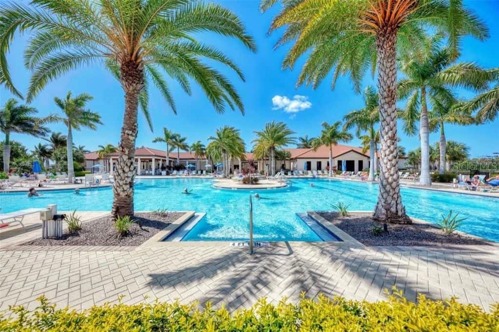 Long term Rental avail immediately. Or Seasonal Avail for Jan, Feb, March, April 2025 at $8000/month 3 months minimum. A STUNNING 3br/2ba/2.5 Car Garage Luxury Golf Community Condo with 2-Golf Memberships in the most sought-after Sarasota National 18-hole championship golf course. This beautiful turn-key condo boasts an open floor plan with high ceiling, the gourmet kitchen features a free-standing island with space enough for four stools and a large under mount sink and plenty of storage. Plentiful natural light pours into the home through the spacious lanai, creating the perfect indoor/outdoor feel for entertaining and relaxing over looking the golf course and the most beautiful Florida sunset. Home is immaculate and the perfect place to enjoy a long vacation in Beautiful Venice Florida, short drive to the beaches, centrally located to shopping, best local restaurants. The highly sought-after gated community of Sarasota National is maintenance-free, resort-style living at its finest! Amenities include a resort style pool and hot tub with a tiki bar, 7000 sq. ft. fitness center and day spa, tennis, pickleball, bocce ball, card room, coffee shop/library, dog park, playground, event lawn, and 30,000 sq. ft. clubhouse with a restaurant and bar. There is also a 19th hole restaurant for the days you are golfing and want to come in and have lunch or an early dinner. The community's 1300-acre International Audubon Sanctuary offers some of the best water and preserve views in the area and if you like to ride your bicycle or walk, enjoy the ten miles of sidewalks found within the community. Renter to pay sales & bed tax, and $500 cleaning fee, Amenities Transfer Fee payable to community one-time payment of $1000 (Golf ).