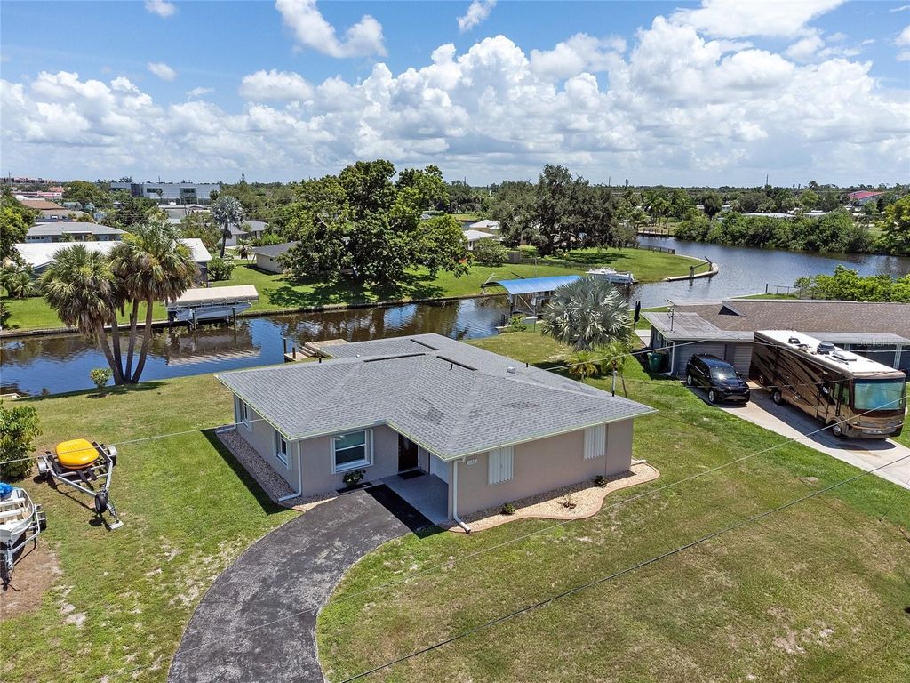 Photo of 132 Concord Drive NE, Port Charlotte, FL 33952 (MLS # C7516507)