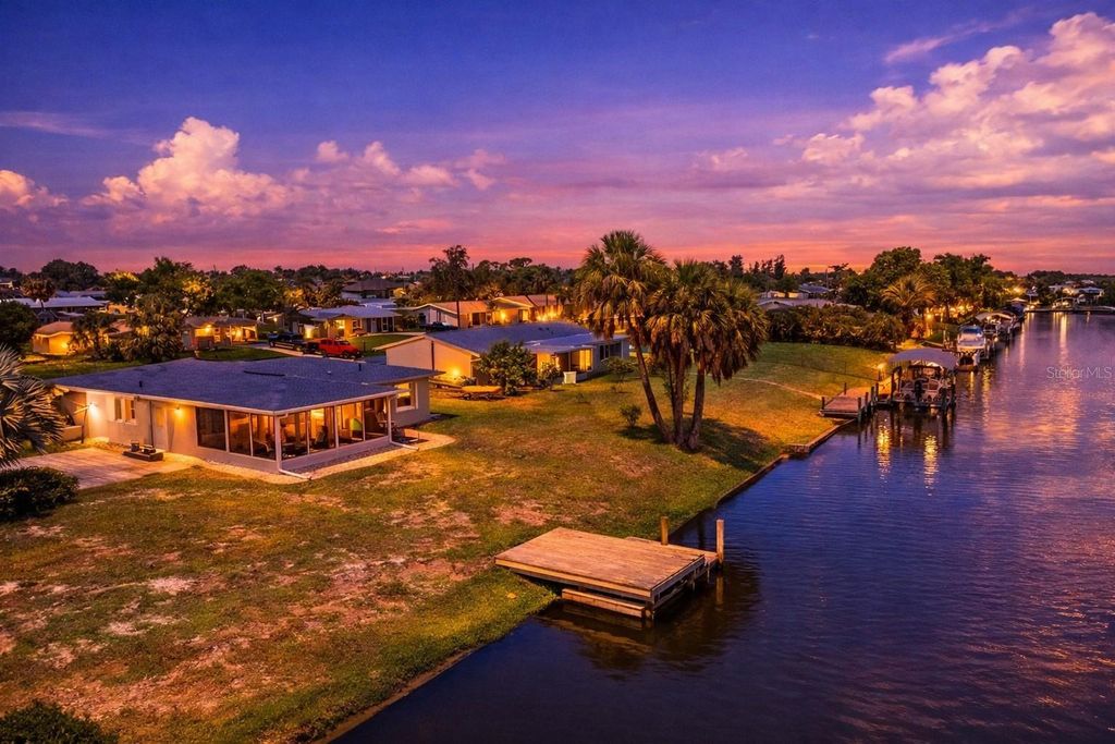 Photo of 132 Concord Drive NE, Port Charlotte, FL 33952 (MLS # C7516507)