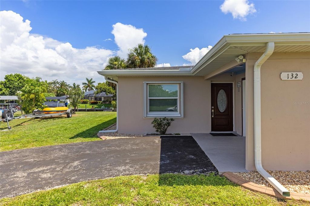 Photo of 132 Concord Drive NE, Port Charlotte, FL 33952 (MLS # C7516507)