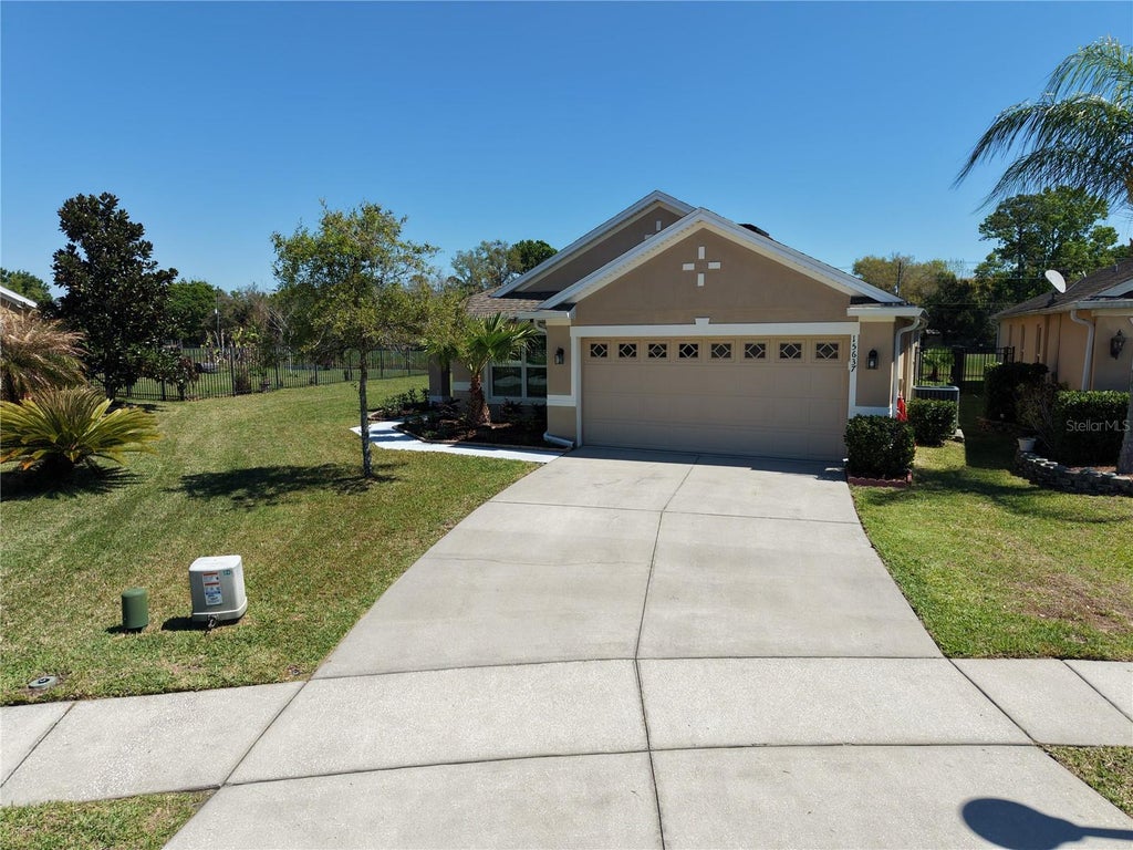 Photo of 15637 Carina Dr, Orlando, FL 32828 (MLS # O6445253)