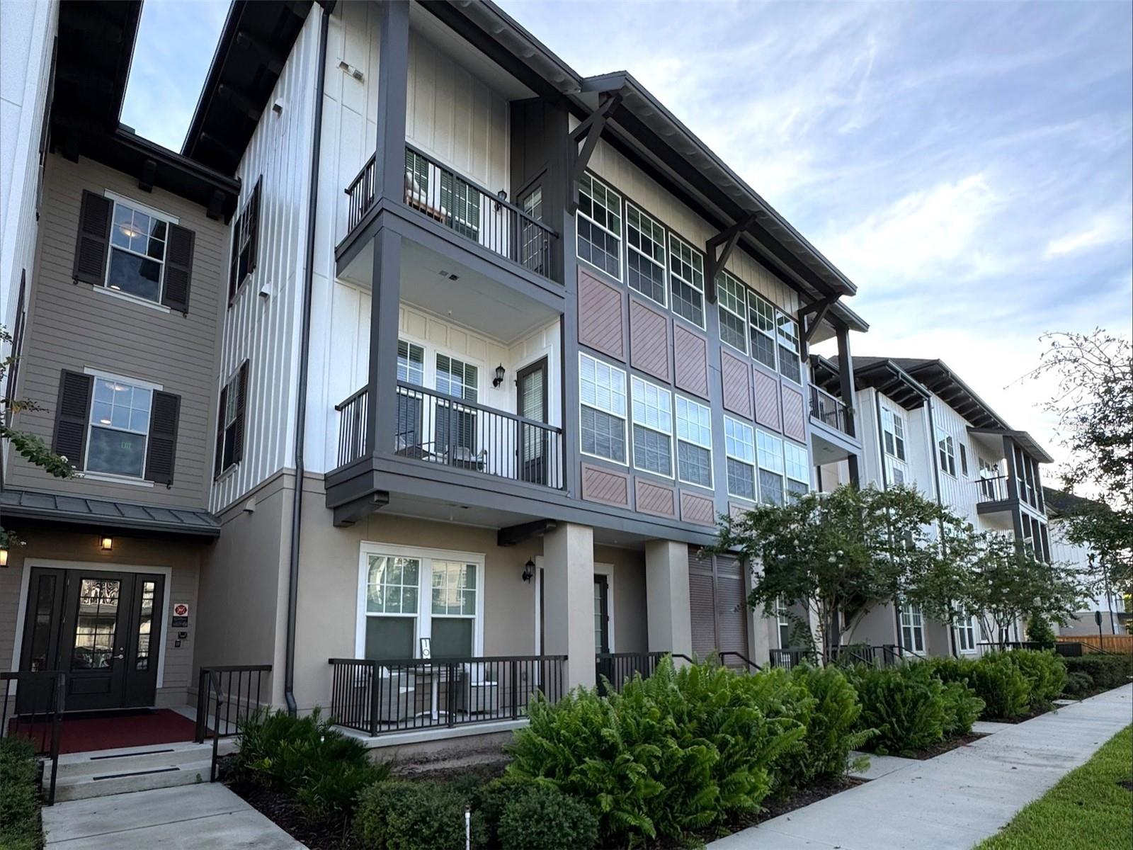 The all-new Colburn Apartment homes feature two home design scheme options; energy-efficient, stainless steel appliances; custom cabinetry with under-cabinet lighting and designer hardware; granite countertops; French-door refrigerators with water/ice dispensers; deep-soaking, garden-style bathtubs; expansive kitchen islands with pantry storage; designer kitchen tile backsplashes; undermount sinks with gooseneck faucets; designer kitchen pendant lighting; wood-style flooring; integrated Sonos® sound systems; keyless home entry systems; 10-foot ceilings; built-in desks; spacious walk-in closets; walk-in, glass-door showers with rainfall showerheads *; double-sink vanities *; bedroom ceiling fans and private patios and balconies. *Only available in select homes. The Colburn amenities include a resort-style pool, outdoor resident lounge, resident clubhouse with a European pantry and tea room, lakeside walking trails, resident maker’s studio, fitness center with yoga/spin studios, adventure playground, bike storage and repair room, planned resident social events, additional outdoor storage available, 24/7 package lockers, access to all celebration amenities, level 1 EV charging stations *, 1st floor retail, dog grooming spa, private conference room, bike storage and repair room, pet-friendly community, planned resident social events, smoke-free community, modern lighting. Residents of the new Colburn Apartments in Celebration, FL, will enjoy convenient access to a variety of nearby shopping areas. These include Celebration Town Center, the Orlando Vineland Premium Outlets, as well as grocery stores such as Target and Publix. At The Colburn, all essential shopping needs can be easily fulfilled. The Colburn offers a diverse array of dining options for residents to explore and enjoy. Near our luxury apartments in Celebration, FL, there are reputable establishments such as Eleven, Trevi's Restaurant, and 7592 Chophouse. At The Colburn, the selection of dining experiences is extensive and varied. The Colburn Apartments also offer proximity to cultural and artistic activities, theme parks and so much more! Price listed is for 15-month lease. Other terms are available. Pricing and availability subject to change without notice.