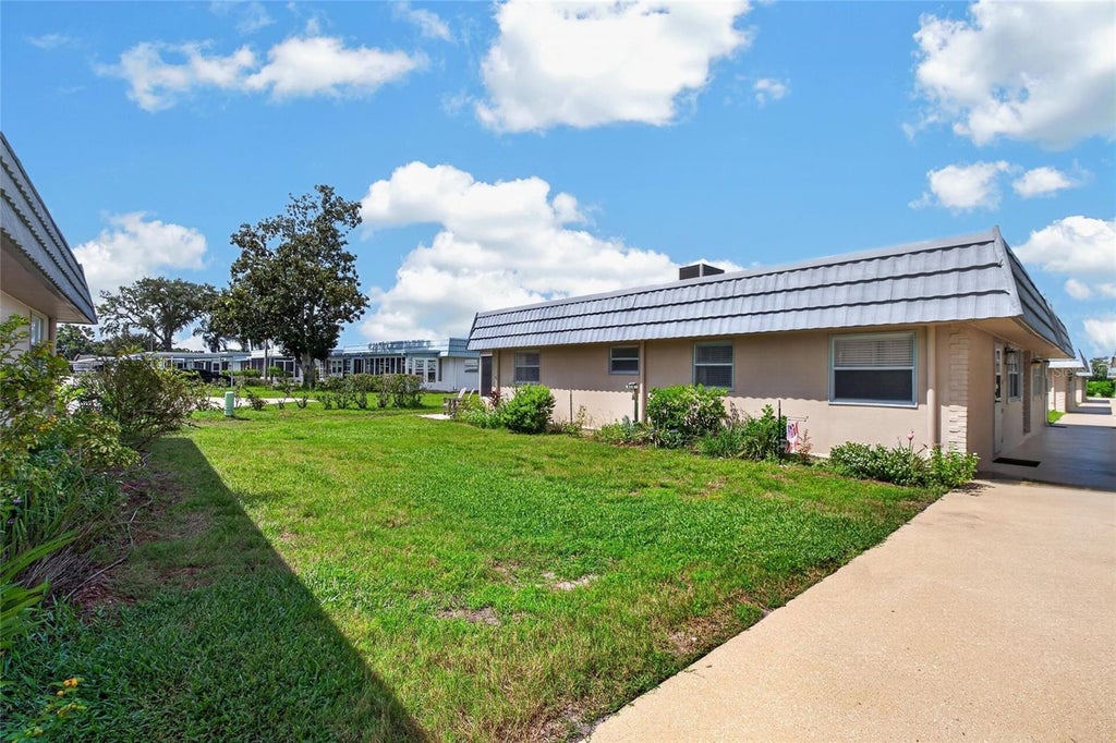 Photo of 1802 Bedford Terrace #180, Sun City Center, FL 33573 (MLS # TB8545956)