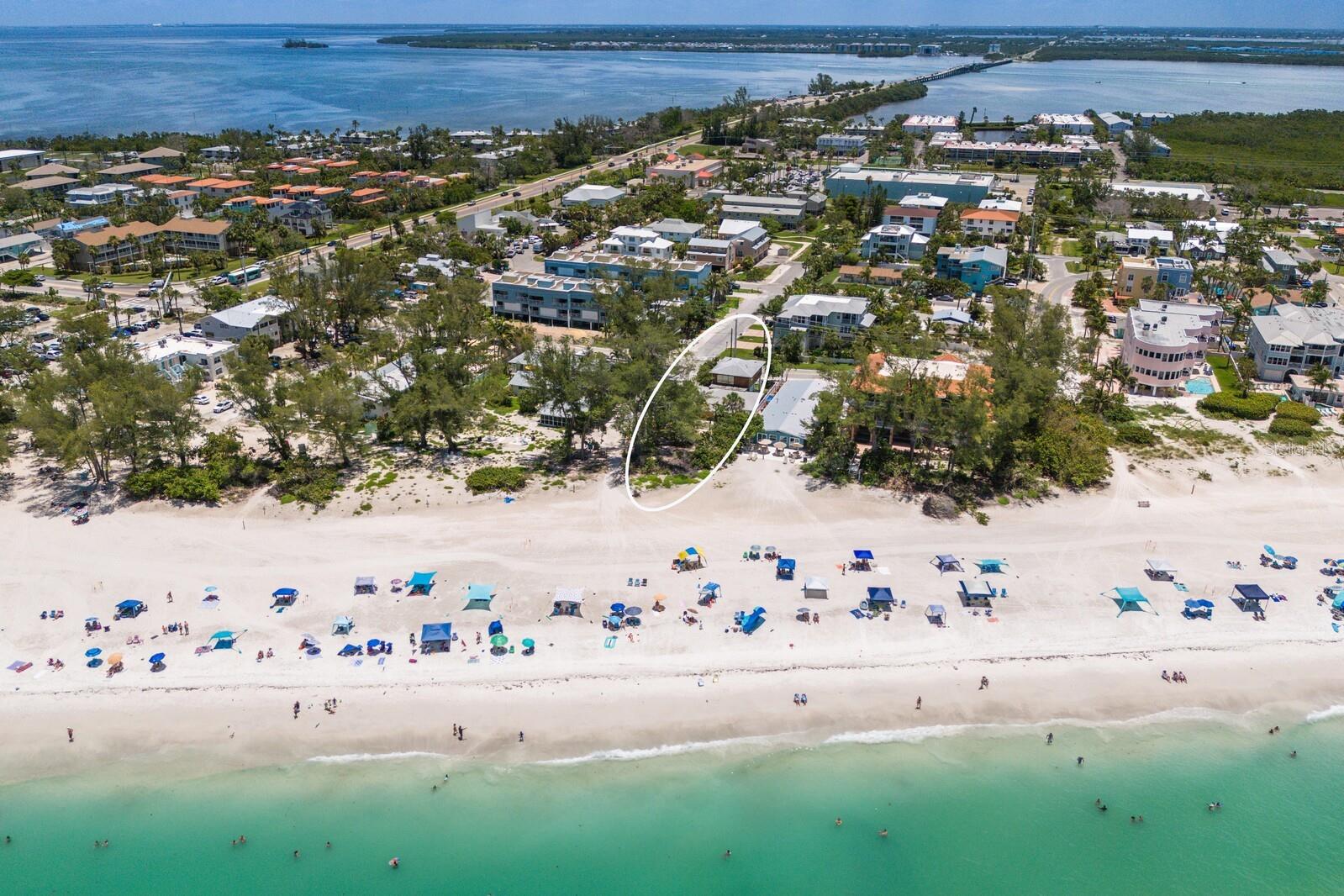 Exceptional Gulf-Front Opportunity in the Heart of Holmes Beach! Discover the perfect blend of island charm and coastal luxury with this rare gulf-front parcel on Anna Maria Island. Ideally located just steps from the sugar-white sands, and surrounded by the vibrant energy of Holmes Beach’s shops, restaurants, and island attractions, this property offers unlimited potential. Whether you envision a custom-designed dream home with panoramic Gulf views and breathtaking sunsets, or you're seeking a high-value investment in one of the island’s most coveted locations, this is your chance to create something extraordinary. There is also the option of potentially refurbishing the current structure if you would prefer. Embrace a laid-back beach lifestyle with dynamic appeal and enduring value. Don't let this magical slice of island life slip away and build your dream retreat today!