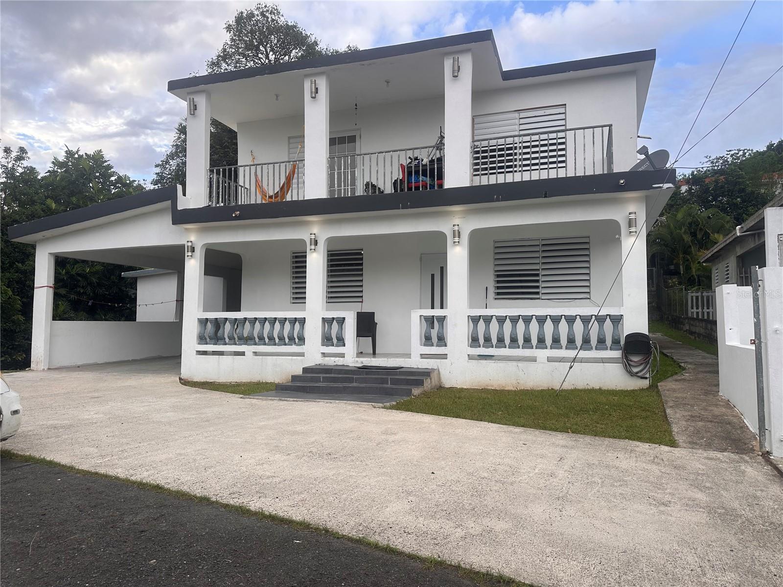 Multifamily property consisting of three separate units. Unit one includes a living room, dinning area, kitchen, three bedrooms and one bathroom. Unit two features living room, dinning area, kitchen, two bedrooms and one bathroom, Unit three is a studio with one bedroom and one bathroom.