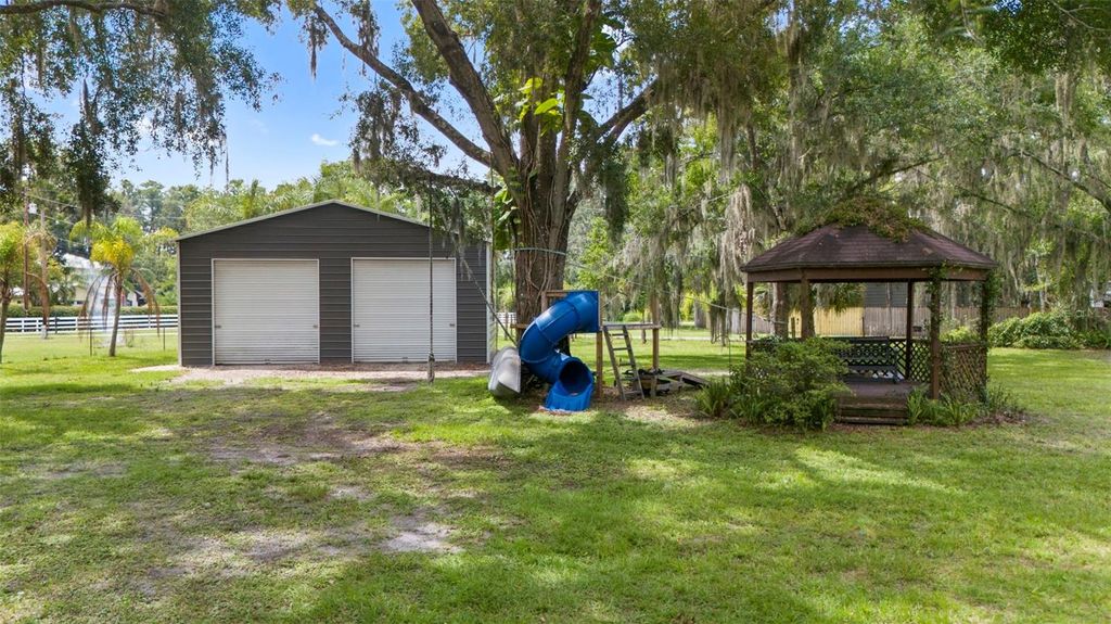 Photo of 20716 Gardenia Drive, Land O Lakes, FL 34638 (MLS # TB8409689)