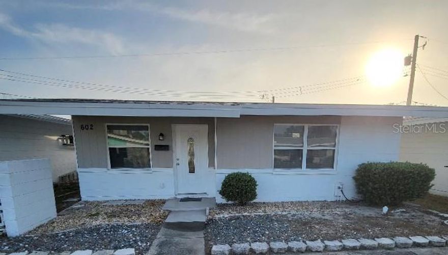 This one bedroom home is located in an age restricted 55 plus community where you have clubs to join, trips to go on, golf, swimming and more ! It has a covered parking space, a screened in lanai to enjoy the morning fresh air. The laundry room has storage cabinets, the galley style kitchen has bee redone with cabinets, granite and stainless appliances. There is a living and dining area plus a bonus room for hobbies or an office. The hallway has a linen closet and the bath has been updates also. Your bedroom has a built in in closet and remote ceiling fan to cool you off at night. The home is located near the shopping plaza and north clubhouse so you can walk or ride a bike if you'd like. Unfurnished and ready for you to move in.