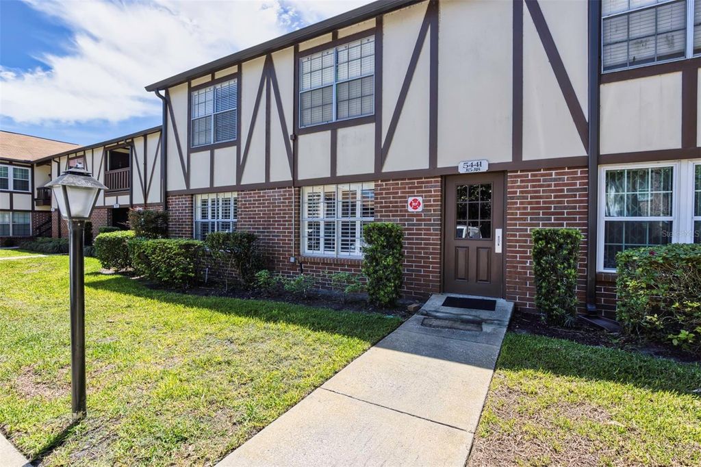 Photo of 5441 Hansel Avenue #J15, Orlando, FL 32809 (MLS # O6398432)