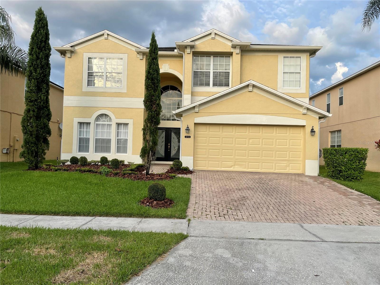 Beautiful 5 bedroom, 4 full bath 2 stories family home in the community of Bella Vida, Avalon Park, Florida. 1 bedroom and 1 full bath down stair, master bedroom and 3 other bedrooms and 3 full bathrooms with the bonus room upstairs. Huge screened porch with golf green for putting and basketball inside screen porch. Ceramic tile flows throughout the first floor and with laminate throughout the second floor. The large formal living room, dining room and kitchen combo welcome you from your first steps into the home. The open, eat-in kitchen features plenty of wood cabinets for storage, granite counter tops, large counter kitchen sink, and stainless steel appliances. Owners escape to the large Master Suite with private bathroom, featuring garden tub, step-in glass shower, and his & hers sinks. This home has been well maintained inside and out! Step outside to the large screened-in porch with green for golf putting if you love golf and basketball. This makes for a great area to relax and enjoy or to entertain family and guests! Located in a gated community with access to tennis & basketball courts and a park! Do not miss this opportunity!