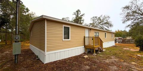 Photo of 16040 Caldwell Lane, Spring Hill, FL 34610 (MLS # O6383324)