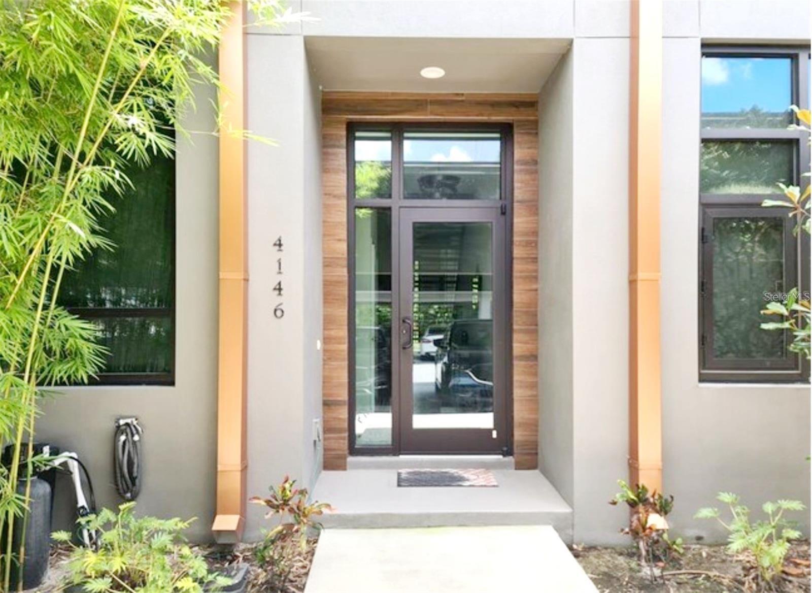 Available end of JULY. AMAZING opportunity to rent one of the most sought-after LOFT-STYLE TOWNHOMES in Tampa Bay! This spacious 2 bed/2 bath townhome has the WOW FACTOR you’ve been searching for and is decked out with luxurious UPGRADES including STAINLESS STEEL appliances, granite counters in the Kitchen and Baths. Soaring FLOOR TO CEILING HURRICANE IMPACT WINDOWS that provide an abundance of natural light and safety throughout—the kitchen and living room features beautiful concrete floors. The second floor includes the master bedroom and loft/office space. New wood-like waterproof laminate floors on the entire 2nd floor and the loft area. Head up the elegant SPIRAL STAIRCASE to your very own ROOF TOP DECK (w/nearly 300 sqft of outdoor living space!). Washer and dryer included. Fenced-in back yard with a deck and astroturf. The lawn service is included. This gated community has beautiful brick roads overlooking a pond with a fountain, and amenities include a community pool. Centrally located in the heart of Tampa/Carrollwood, proximity to Raymond James Stadium(Buccaneers) and George Steinbrenner Field(New York Yankees). This gated community offers plenty of parking and a pool