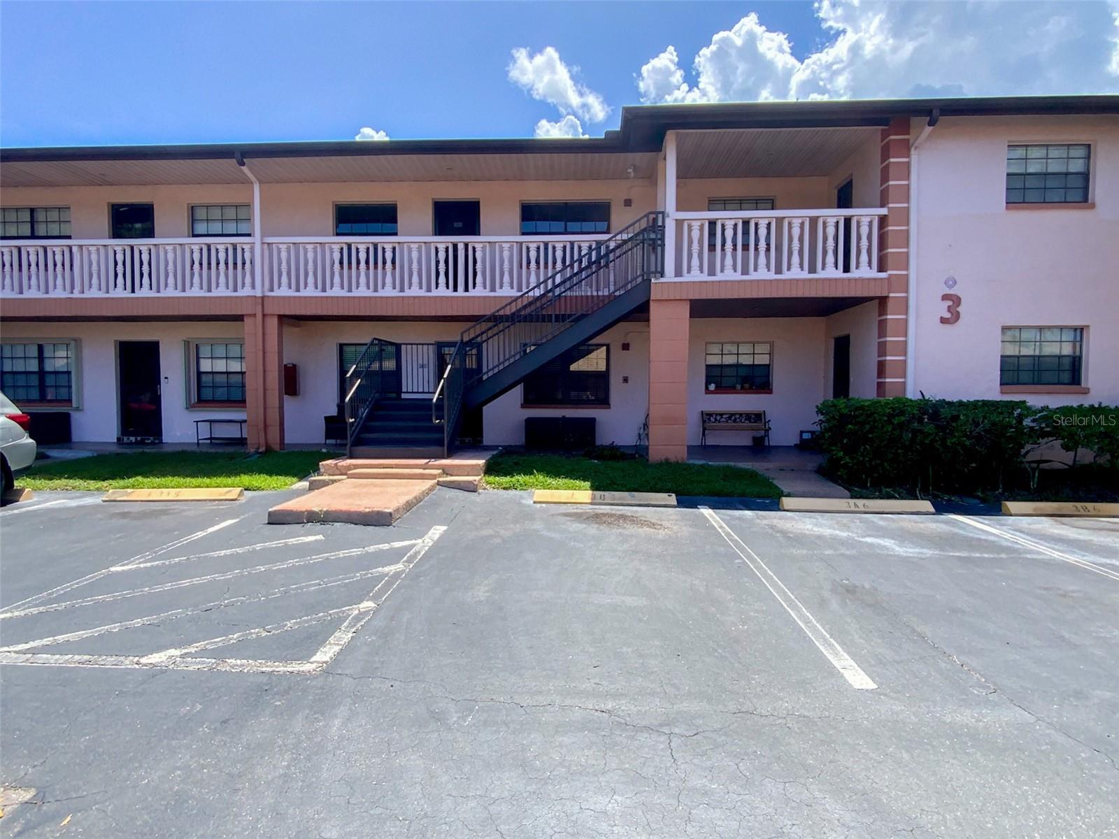 Welcome to this second-floor condo at the Ridge Groves at Largo! This 2-bedroom 2-bath floor plan has over 1100sf and is available for a long-term lease. The kitchen offers custom cabinetry, appliances, a pantry for added storage, and a pass-through window to the dining room and family room for effortless entertaining. The master bedroom has a private bathroom with a large walk-in closet. A full-sized indoor laundry room with extra storage is a bonus. Newer HVAC system. This spacious unit comes with an assigned parking space and is just steps away from the community pool. The rent includes water and trash removal. The community features include a clubhouse and a heated pool. Great location! Near Largo Mall, Largo Recreation Center offers an Aquatic Center, Water Park, Playground, basketball, softball, and tennis courts. A must-see!