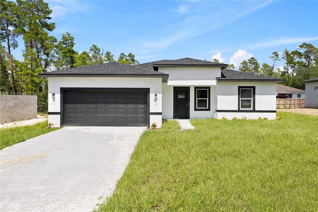 Photo of 5217 SW 165th Street Road, Ocala, FL 34473 (MLS # O6376832)