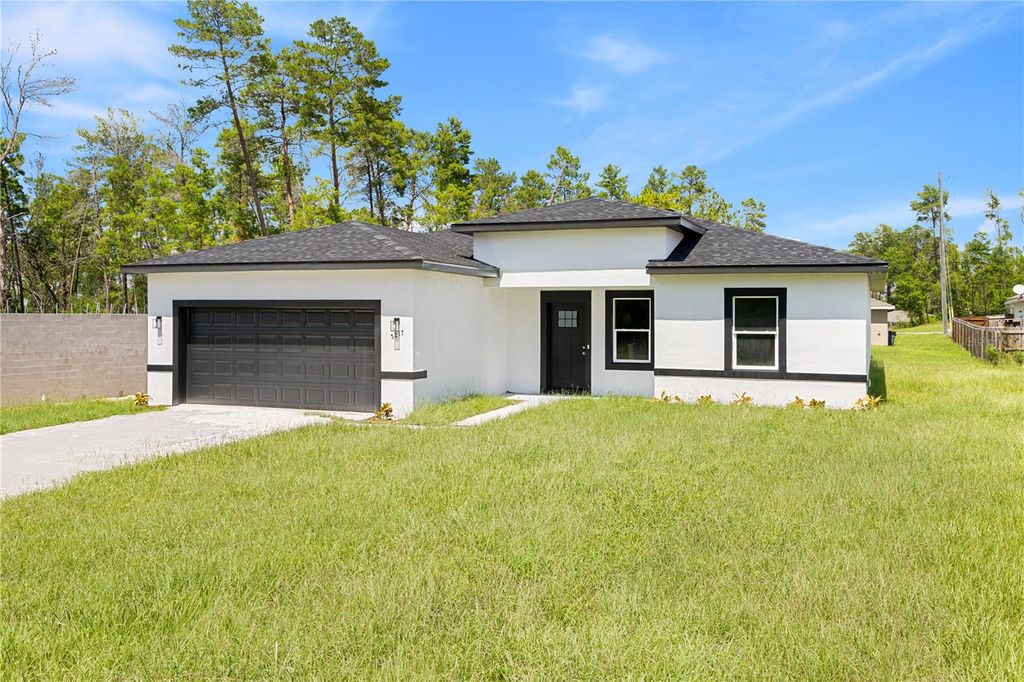 Photo of 5217 SW 165th Street Road, Ocala, FL 34473 (MLS # O6376832)