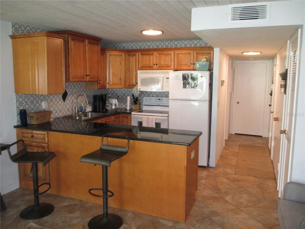 Photo of 1441 N Atlantic Avenue #113, Daytona Beach, FL 32118 (MLS # O6426801)