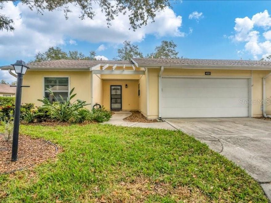 2BR/2BA villa in a maintained 55+ community with a brand-new roof (Dec 2025), updated interior finishes, and a quiet setting with mature trees and wide green space behind the home. This single-story residence offers an efficient layout with an enclosed all-season lanai featuring sliding glass windows that open or close as needed for year-round use. Updated flooring and modernized baths add comfort and function throughout the home. The floor plan includes a spacious living area, dining space in the kitchen, and two well-sized bedrooms A two-car garage provides secure parking and additional storage options.

Exterior maintenance and landscape care are included through the association for easy living. Community amenities include a pool and clubhouse located within the neighborhood. The property benefits from the peaceful interior location of the community while still offering quick access to everyday conveniences and Sarasota destinations. Nearby shopping and daily essentials include Publix Beneva Village (1.1 mi) and Detwiler’s Farm Market (1.2 mi). Urfer Family Park is 1.6 miles away and offers nature trails, boardwalks, greenspace, and activity areas. Sarasota Memorial Hospital is 4.1 miles away, and downtown Sarasota is 5.6 miles away with restaurants, arts venues, waterfront parks, and retail. Siesta Key Beach is approximately 6.3 miles away for Gulf access and beach recreation.

The villa’s location within the community provides reduced through-traffic and a calmer setting. The floor plan included in the listing photos shows the functional room flow and layout. A Zillow 3D Home tour is also available for an immersive view of the property. This well-maintained villa blends updated interior elements, practical features, and a low-maintenance lifestyle in a convenient Sarasota location close to shopping, parks, healthcare services, and area beaches. All information is deemed reliable but should be verified by the buyer.