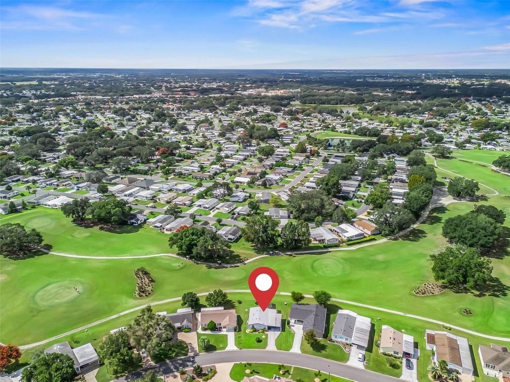 Photo of 1336 E Schwartz Boulevard, Lady Lake, FL 32159 (MLS # G5103522)